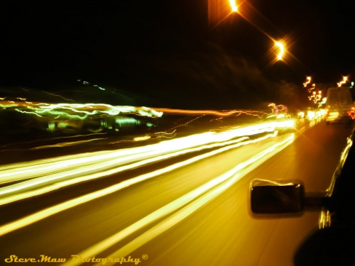 Light trails while riding down the highway with your wingman
