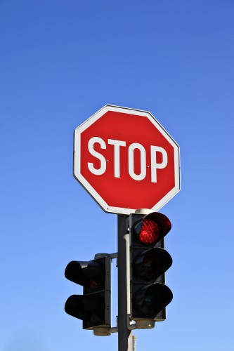 Stop sign and red traffic light