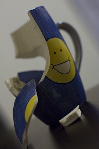 Broken smiling mug