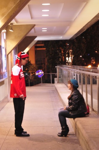 Couple meeting each other, because of their hats