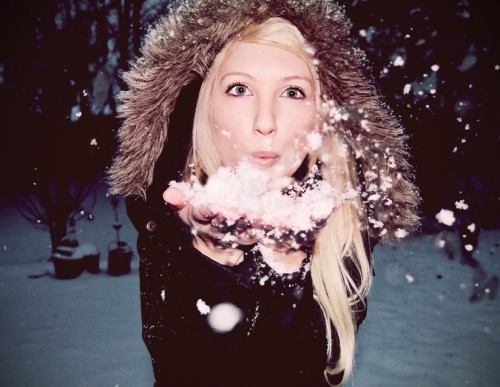 Shandi-lee XX {hello, December!} Woman blowing snow from her hands