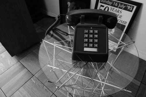 day 091: telephone snobbery A black telephone on top of a glass table